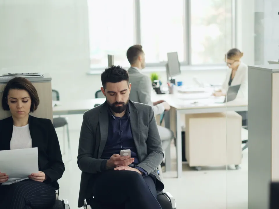 Staff working in a modern open-plan office