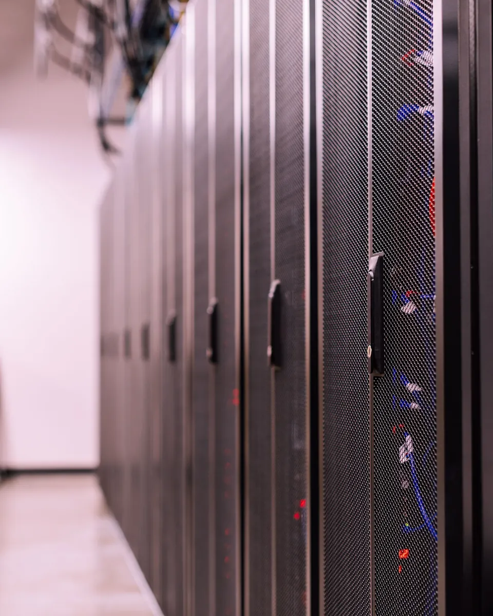 Rows of server cabinets in a data centre